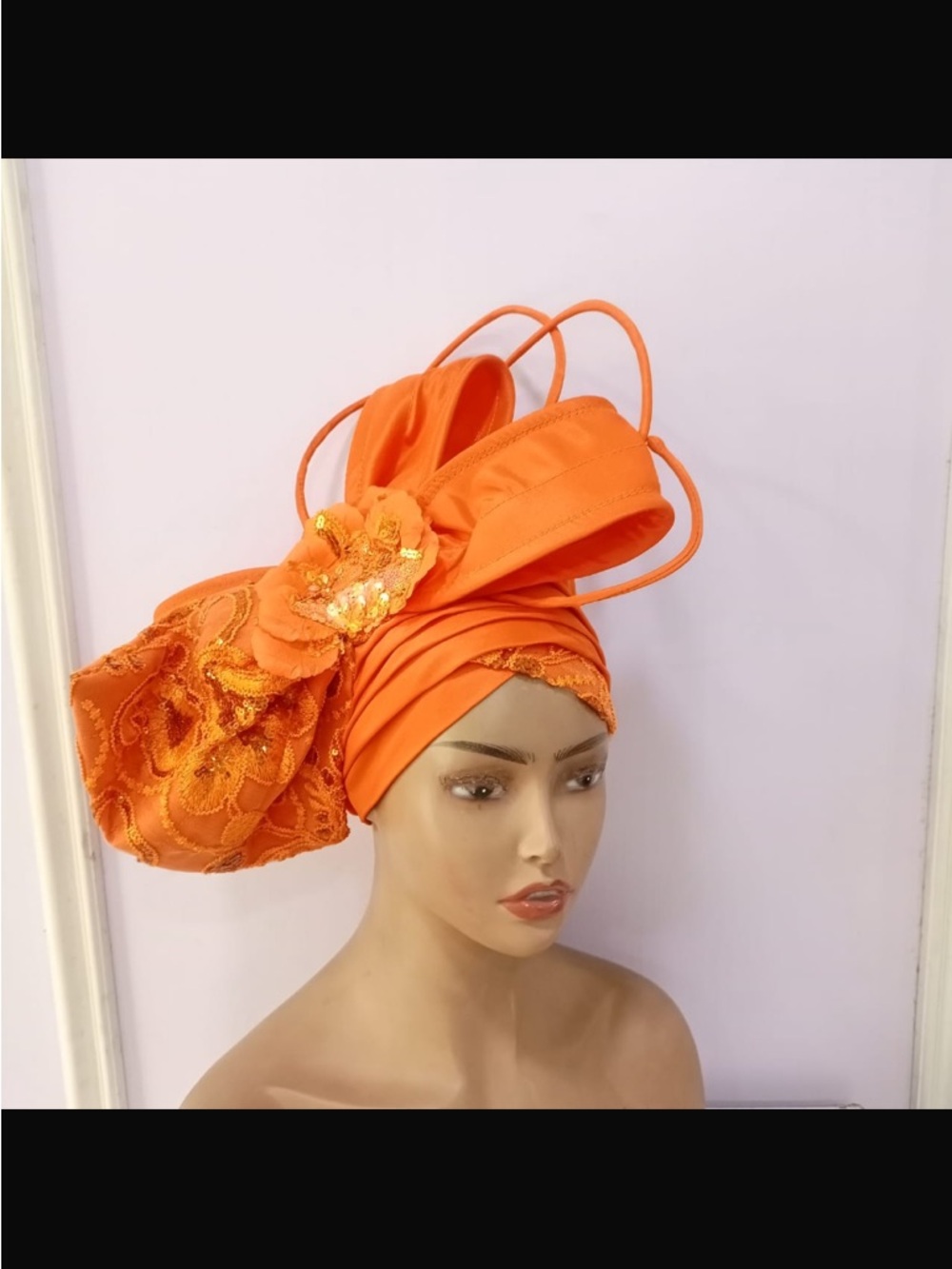 Elegant Orange Headwrap with Decorative Bow